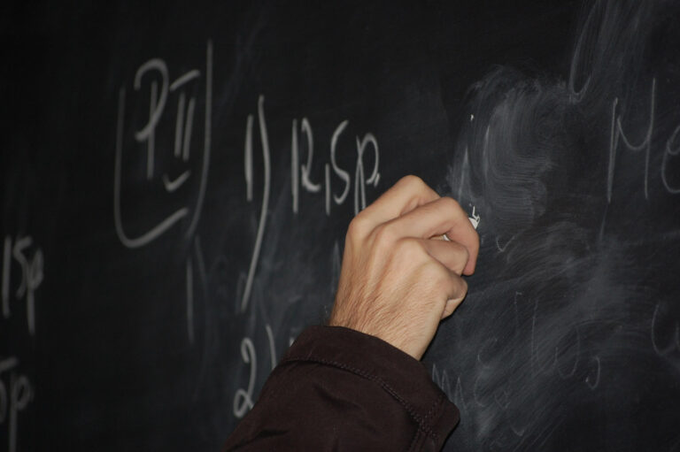 Teacher with Blackboard
